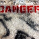 concrete ground with red danger text print