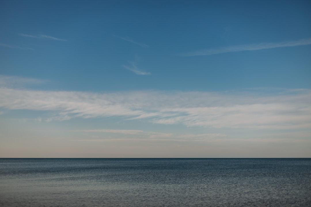 blue sky and white clouds over the sea