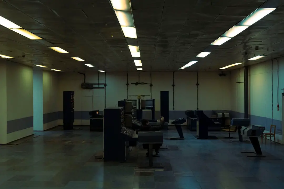 A dark, empty room with fluorescent lights.